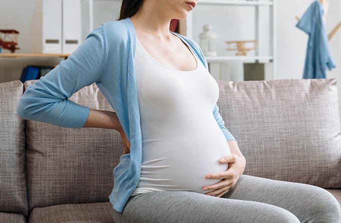 Image of a pregnant lady with back pains